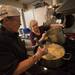 Volunteers John Gary and Sandy Yarbrough make mashed potatoes in the Vineyard Church kitchen.
Courtney Sacco I AnnArbor.com    